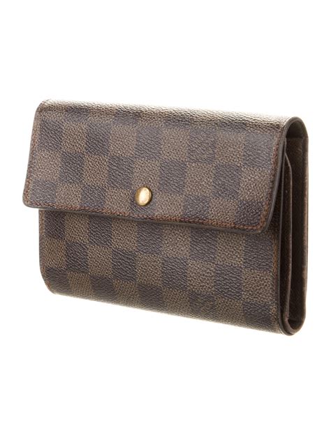 louis vuitton damier ebene canvas international wallet|louis vuitton small zippy wallet.